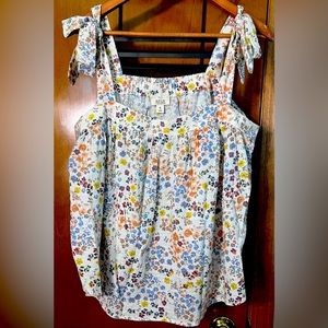 Beautiful a.n.a. tank with a fabulous floral print with a mid drift fit.